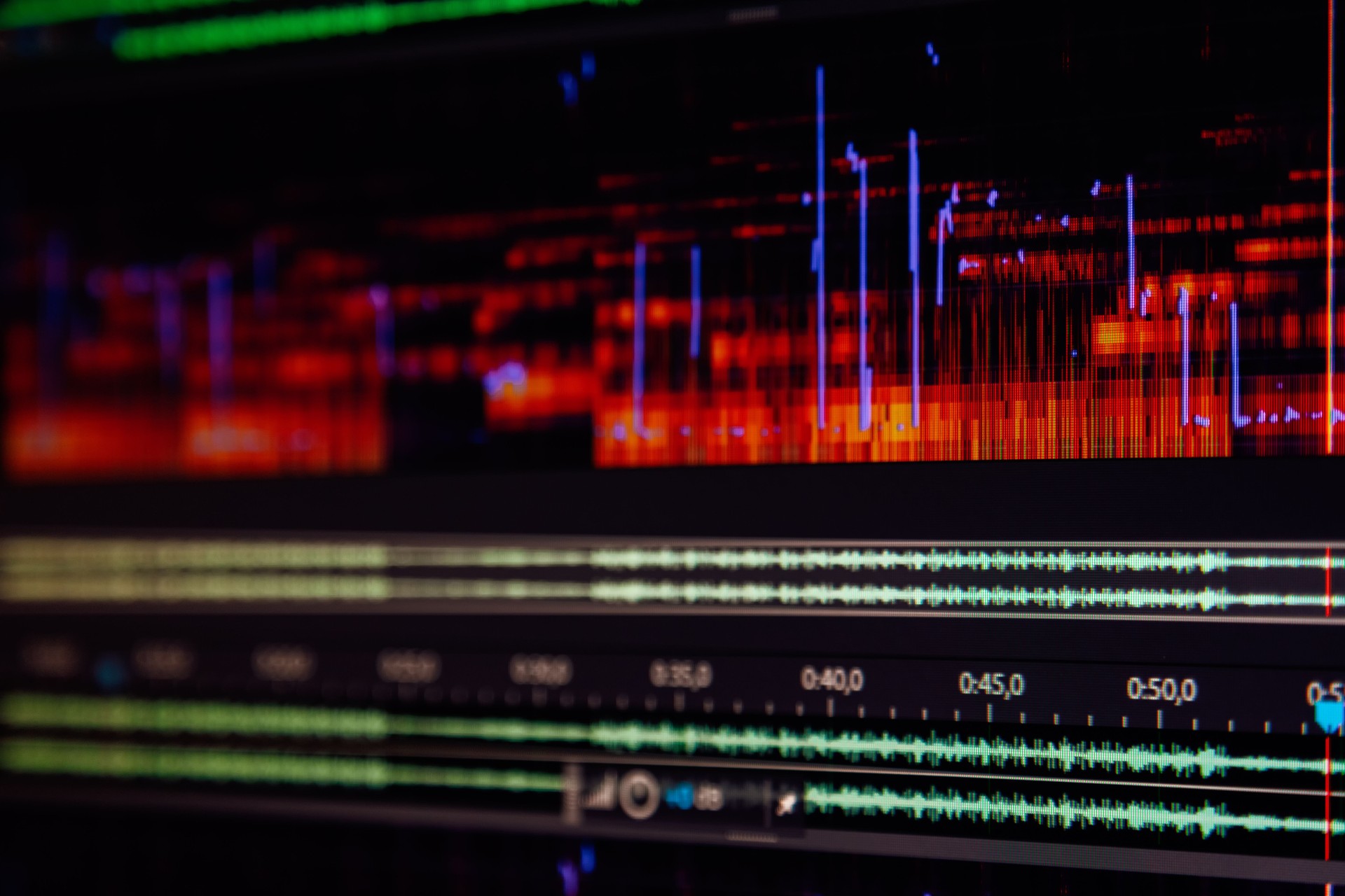 Close-up macro of audio editing timeline whith a spectrum analyzer